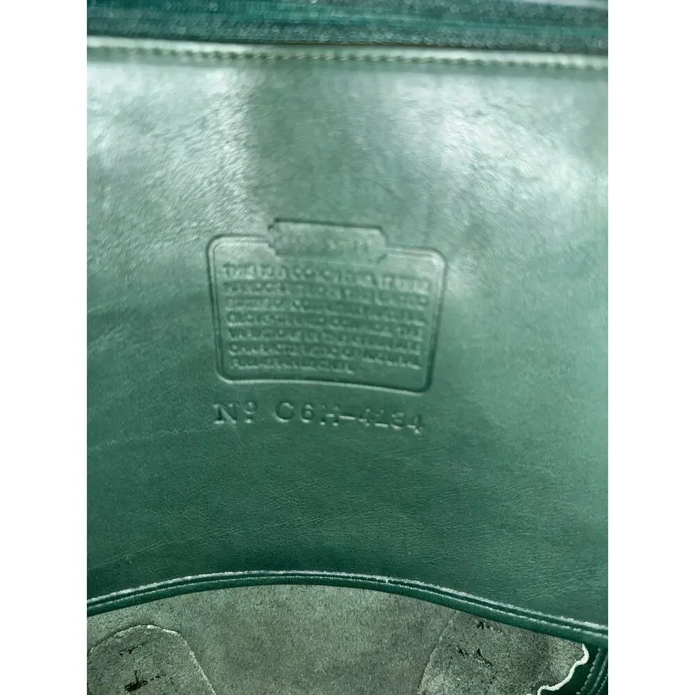 Green Leather Backpack with Gold Ring Accent